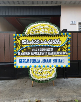 Papan Bunga Duka di Muara Jaya